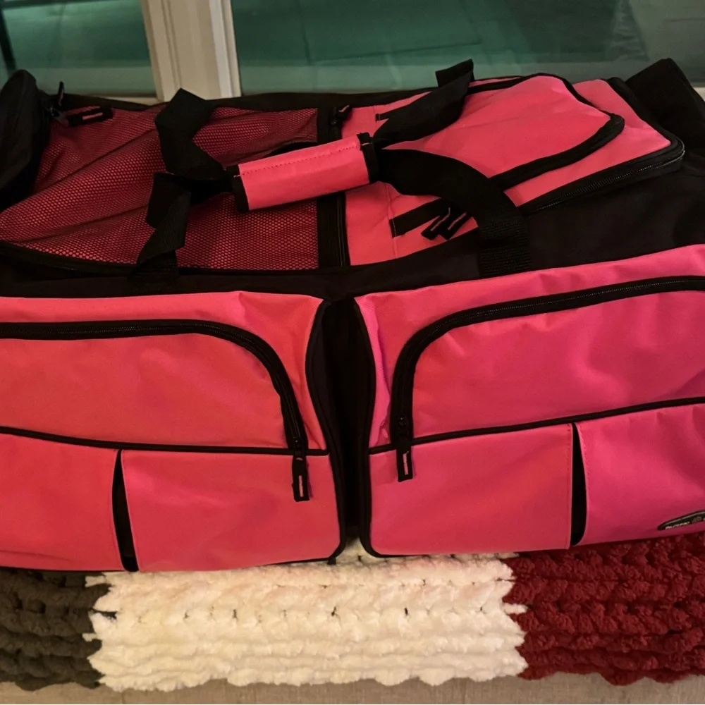Pink and Black Garment Bag with Wheels 30” long• 16” wide• 14” high